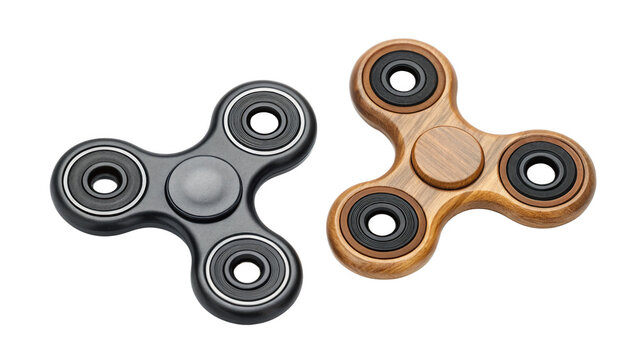 Two fidget spinners on a black background, one metal and one wooden