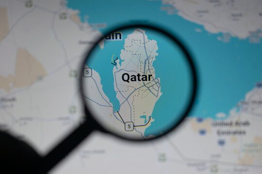 Map of Qatar seen through magnifying glass highlighting Gulf geopolitics, LNG, LPG, petroleum exports, crude routes via Strait of Hormuz amid Iran war tensions involving USA, Israel and energy securit