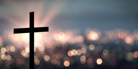 The Cross Silhouette Against Soft Bokeh Lights and Radiant Sunrise Background