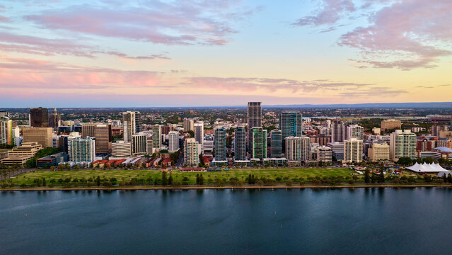 Perth City at Sunrise, Western Australia &ndash; 4K Aerial Drone View of Skyline, Swan River, Central Business District, CBD, Modern Skyscrapers, Waterfront Marina, Swan River and Golden Morning Light