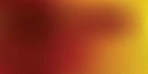 Obraz premium Soft abstract warm gradient background featuring blended orange, red and yellow tones with a smooth blurred texture and glowing light effect,