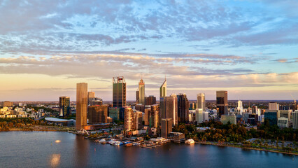 Perth City at Sunrise, Western Australia &ndash; 4K Aerial Drone View of Skyline, Swan River, Central Business District, CBD, Modern Skyscrapers, Waterfront Marina, Swan River and Golden Morning Light