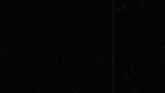 Damaged analog tape overlay with magnetic noise, tracking errors, and VHS glitches. Professional 4K old film tape defects texture for retro themed video editing.