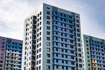 Fototapeta premium Modern apartment buildings shaping urban skyline, featuring residential real estate and city living