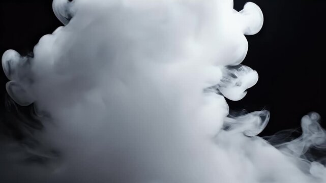 Swirling white vapor rises and dissipates against a stark black background