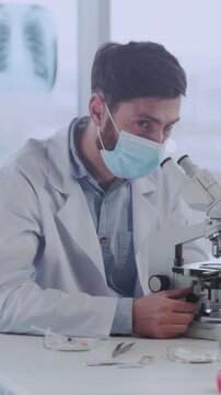 Healthcare specialist performing diagnostic procedures while engaging in professional and patient communication