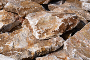 Natural stacked stone wall cladding brown facade texture