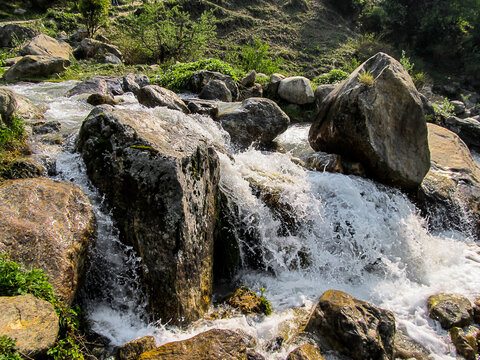 Abundant Mountain Stream flowing over rocks at Nagling, Darma Valley, Uttarakhand, India