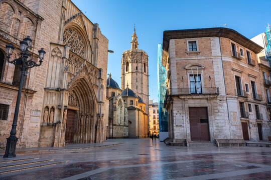 Plaza de Virgen with views of the cathedral of Valencia and the tower of El Miguelete, Spain.