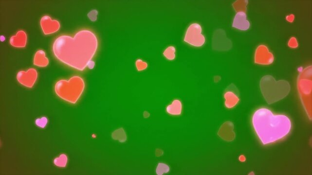 Floating heart particles animation with soft slow drifting trajectories random directional flow varied heart sizes luminous red and pink colors transparent glow edges clean green screen environment sm