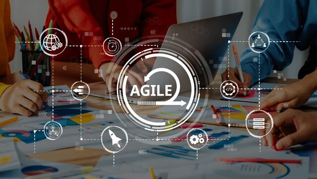 Dynamic scene of a creative workshop where diverse team members engage in planning and strategy development using agile concepts and methodologies. Raster