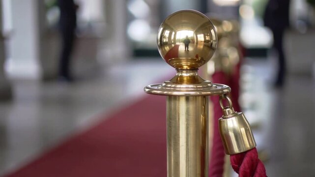Rope velvet barrier with gold stanchion and red carpet for event access control featuring entrance, VIP, luxury