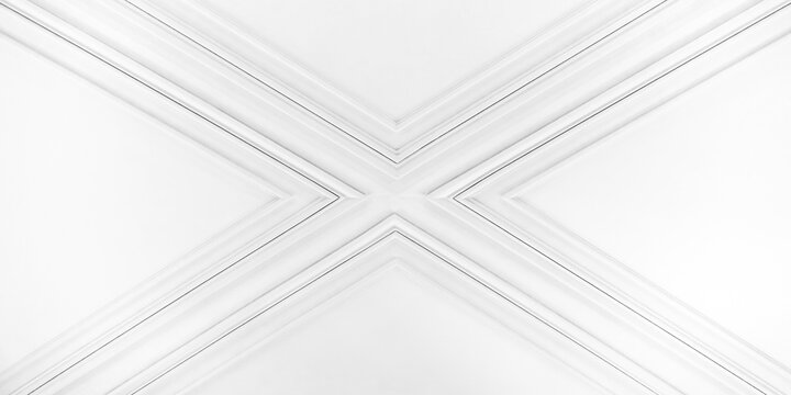 Close-up of view decorative architectural molding forming an X-shaped cross, abstract white classic architecture background photo