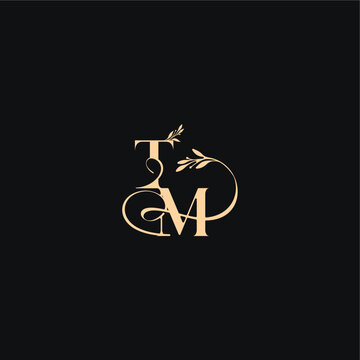 monogram elegant concept luxury feel with wavy line TM organic leaves wedding logo letter