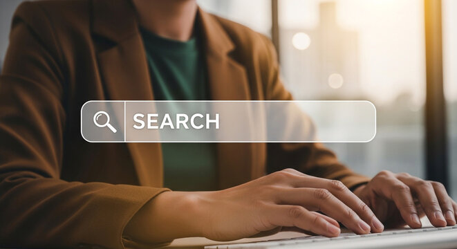 A person typing on a keyboard with a search bar overlay