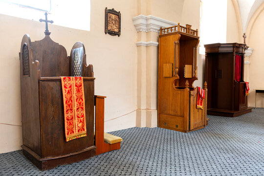 Different confession booths in a Christian church.
