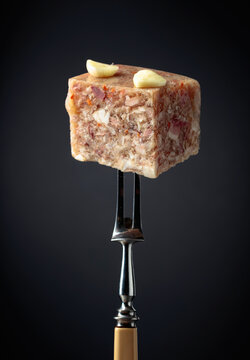 Headcheese on a fork.