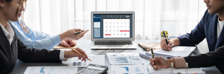Business intelligence and data analysis concept. Analyst team working on financial data analysis...