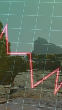 Vertical video: Cam panning revealing pillar coast teal grid pink arrow and zigzag guiding research