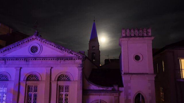 Catholic Cathedral of St James and St Christopher at Night in Corfu Old Town, Greece - Illuminated Venetian Architecture and Duomo Bell Tower in Kerkyra Historic Center at Twilight, Ionian Islands