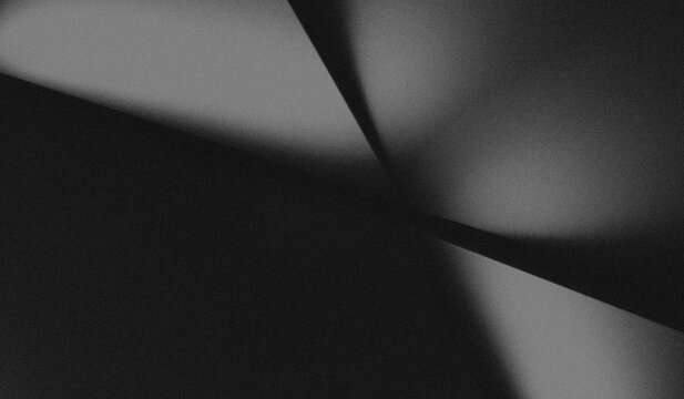 black and grey with geometric shapes with bold, intersecting lines