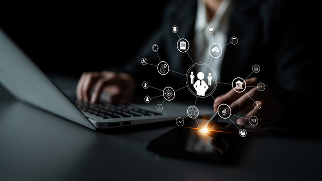 A concept of centralized business management and corporate strategy. A leadership team connecting to all functions like finance, operations, and planning. Motif