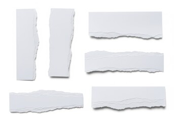 Fototapeta premium A collection of torn paper strips on a white background