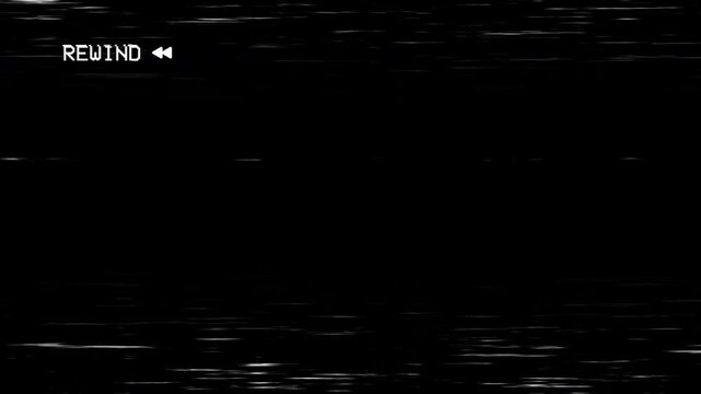 Rewind old film with black and white static vhs screen, evoking vintage nostalgic memories perfect for retrothemed designs and multimedia.