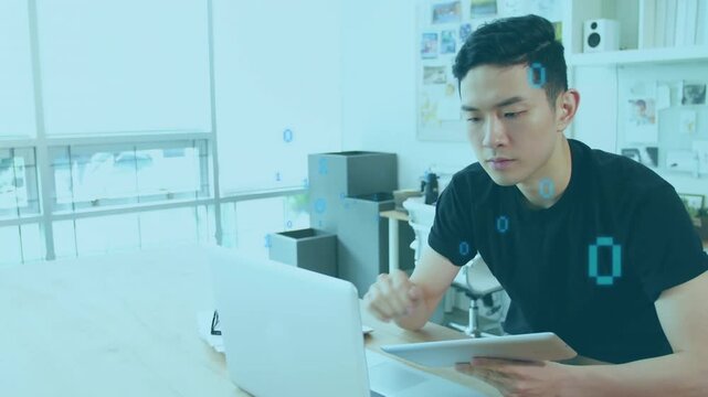 Animation of data processing over asian businessman using tablet