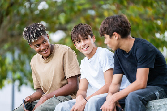 Gen-Z friends enjoying outdoor leisure time together