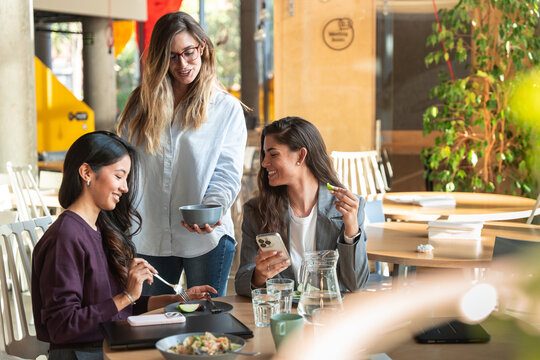 Businesswomen enjoying a collaborative lunch meeting