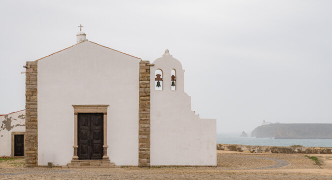 Historic Sagres Fortress in Portugal under cloudy skies