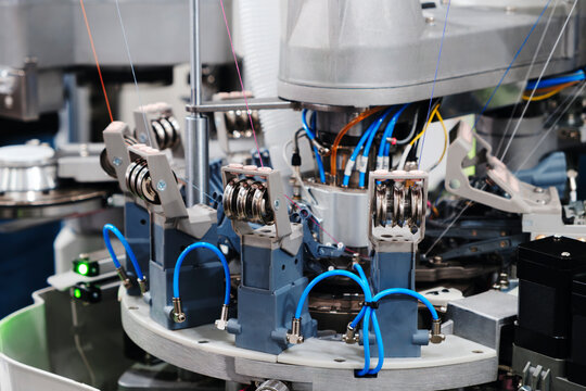 industrial machine for braiding belts, braids, and cords with numerous precision components. Ideal for production and automation.