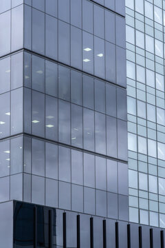 Modern corporate building glass facade close-up