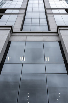 Modern glass facade of financial office building