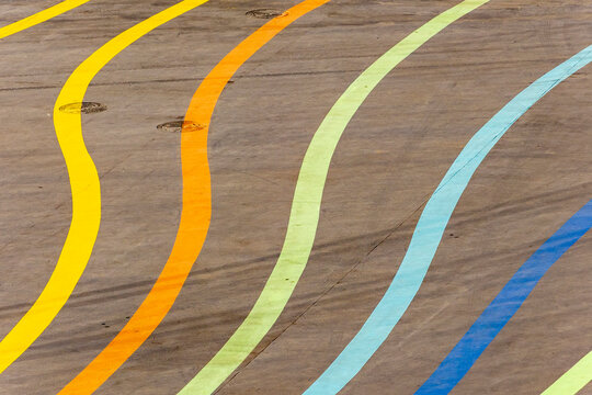 Colorful lines on an empty asphalt surface
