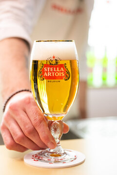Lviv, Ukraine - March 10, 2026: A glass of Stella Artois, a traditional Belgian blond pilsner beer since 1926