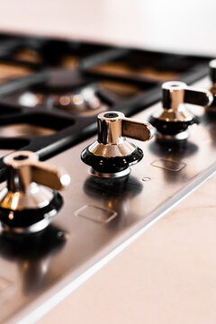 Polished luxury kitchen stovetop with chrome details