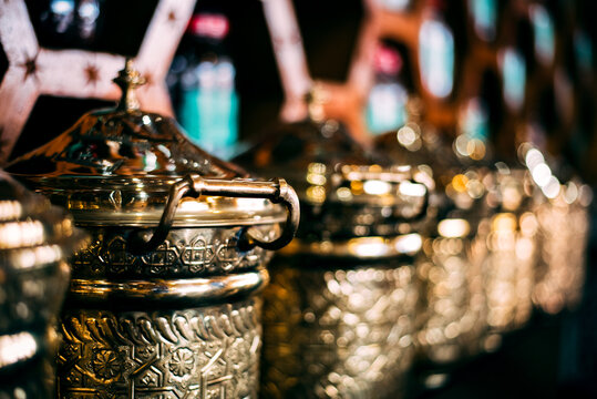 Spice stand with brass jars in Marrakech, Morocco