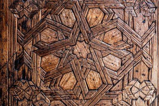 Carved wood wall art in Marrakech with geometric design