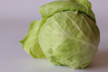 Fototapeta premium Fresh Green Cabbage Isolated on White Background