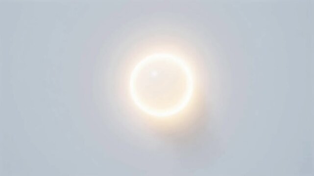 Bright circular light on gray background