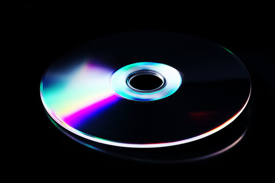 Macro close-up of Y2K CD ROM surface with rainbow data refraction and spinning disc light patterns, iridescent seamless texture