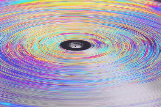 Macro close-up of Y2K CD ROM surface with rainbow data refraction and spinning disc light patterns, iridescent seamless texture