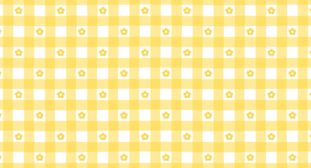 Seamless yellow gingham pattern with daisy flowers. Cute spring background in vichy style. Repeating vector print for textile, fabric, tablecloths and kitchen design.
