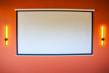 Obraz premium Bangalore, India, 5th March 2026: Enclosed Terrace Bar with Large Screen and Lounge Seating in Modern Luxury Apartment