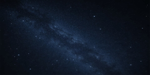 A deep space nebula glows with bright stars and abstract cosmic dust across a dark blue starry night sky background © Alpha Designs