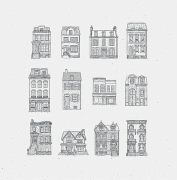 Set of houses collection drawing in old fashioned vintage style with black lines on light background