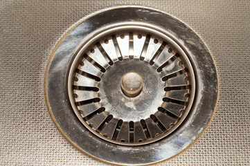 Obraz premium Technological background. Kitchen sink drain hole.