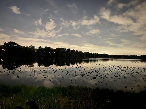 Calm lake with sky reflection at sunset in Altamonte Springs, Florida